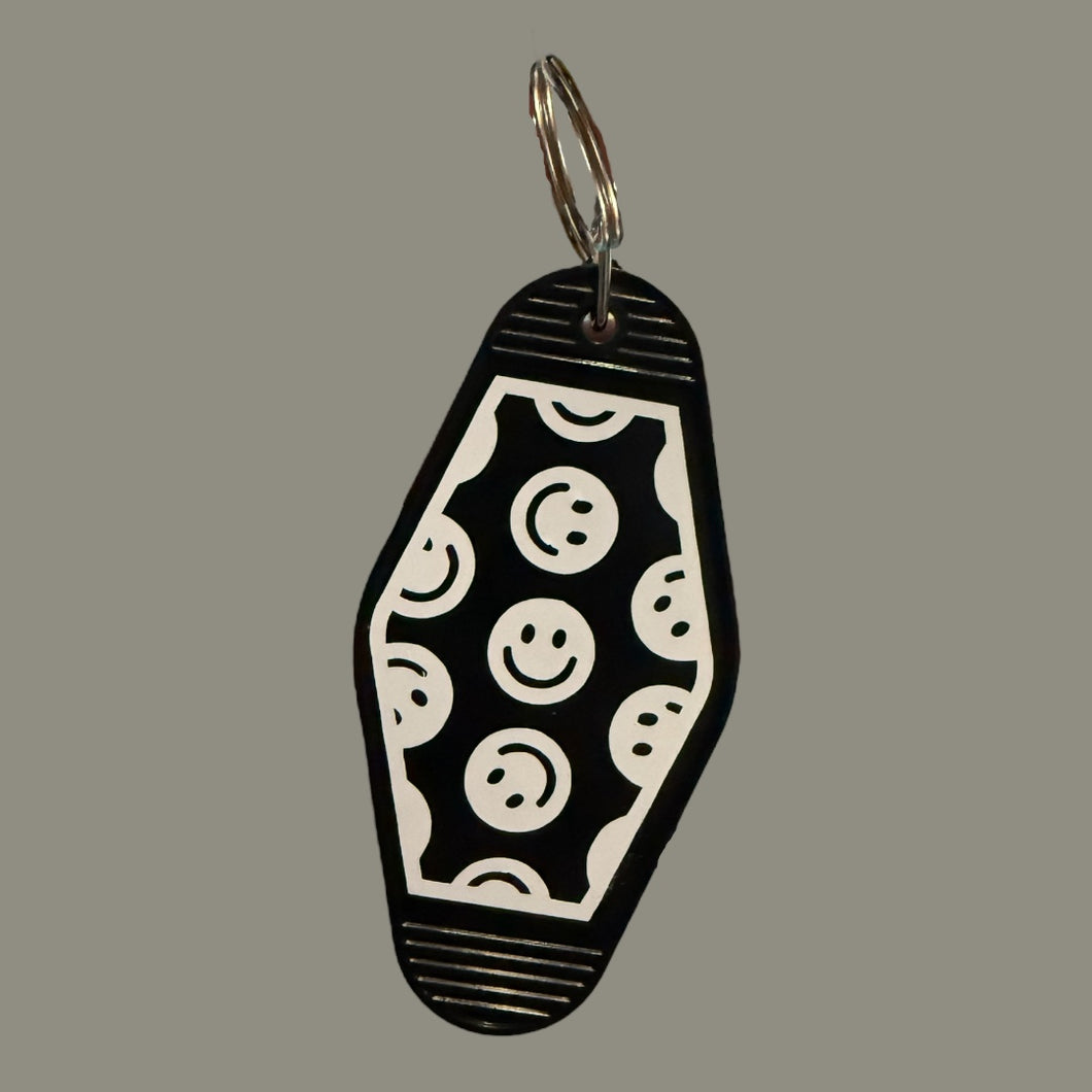 Smiley Coffin Motel Keychain